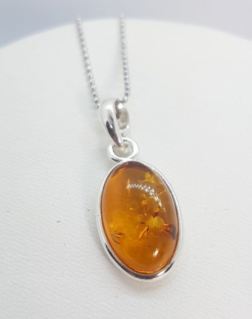 Sterling Silver Pendant with natural honey Amber