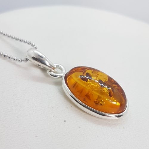 Sterling Silver Pendant with natural honey Amber