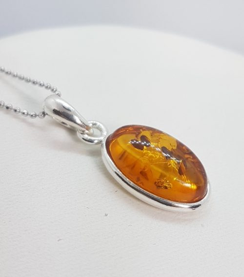 Sterling Silver Pendant with natural honey Amber