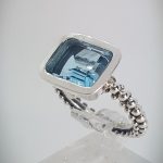 Ring with rectangular blue Topaz