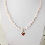 hand made necklace with pearl and amber