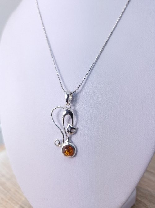 Amber cat and sterling silver pendant