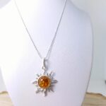 Amber sun pendant - Sterling silver