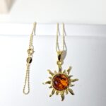 Amber sun pendant - Sterling silver